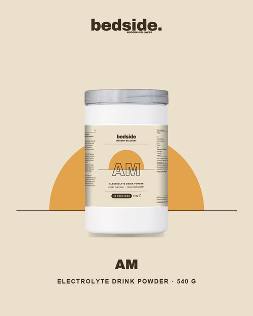 Bedside AM electrolyte drink powder on its amber half-sun